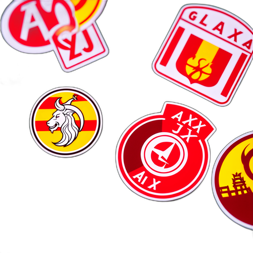 Наклейки з логотипами Ajax та Galatasaray на фоні футбольного поля